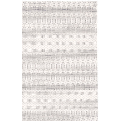Tapis géométrique tissé à la main Busbee