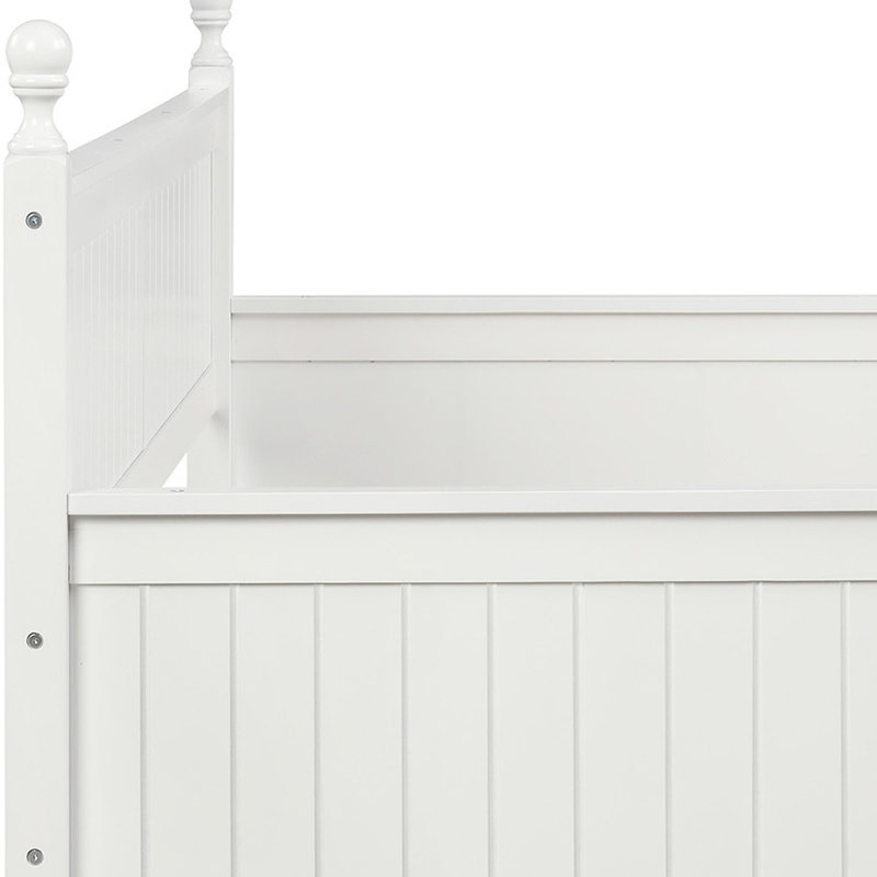 Lit de jour double en bois massif avec trois tiroirs de rangement pour des solutions de couchage et d'assise polyvalentes