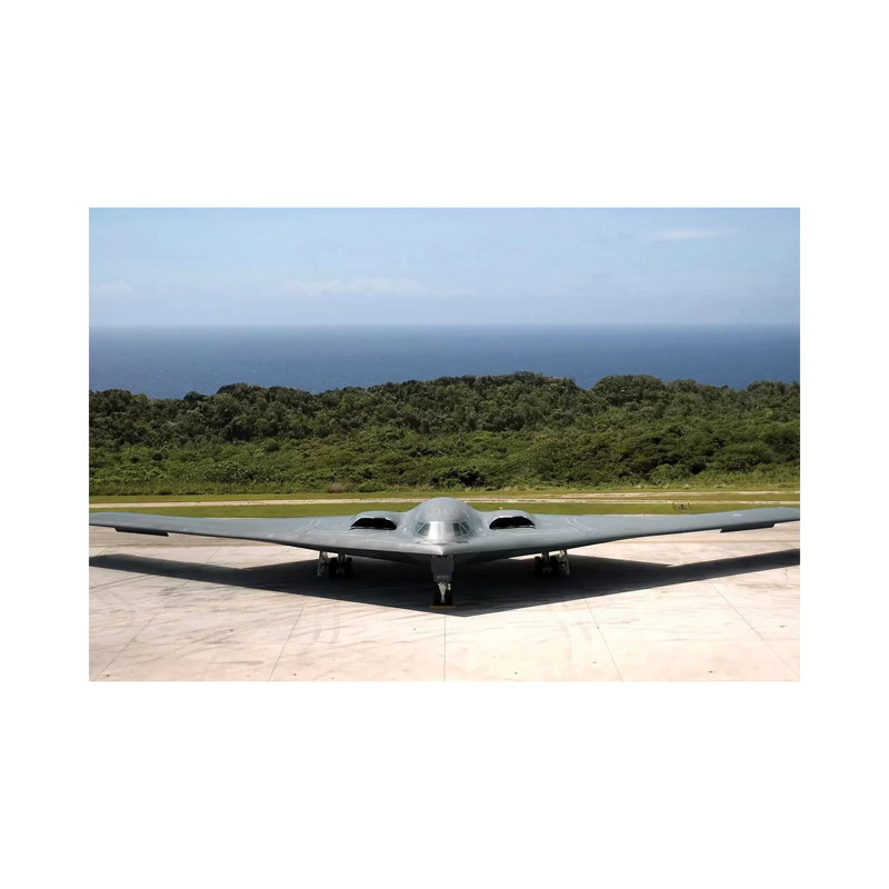 A B-2 Spirit Stealth Bomber Waits On The Flightline - Wrapped Canvas Print, 66.04 cm H x 45.72 cm W x 3.175 cm D