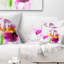 Coussin décoratif imprimé floral mauve