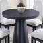 Table ronde en bois noir
