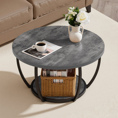 Table basse ronde moderne à 2 niveaux en bois avec rangement ouvert, structure métallique robuste et minimaliste, idéale pour le salon ou le bureau. Montage facile. Couleur : gris.
