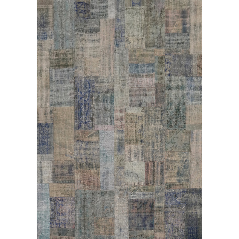Tapis à motif géométrique patiné 8 x 10