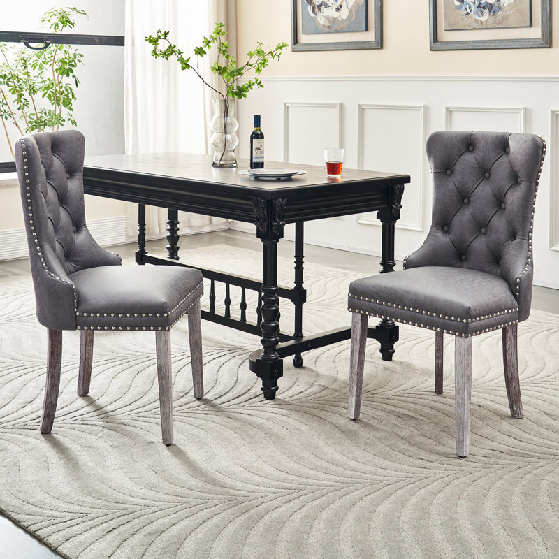 Chaise de salle à manger rembourrée classique avec capitonnage à boutons et décoration cloutée, un choix idéal pour les espaces de salle à manger traditionnels (gris)