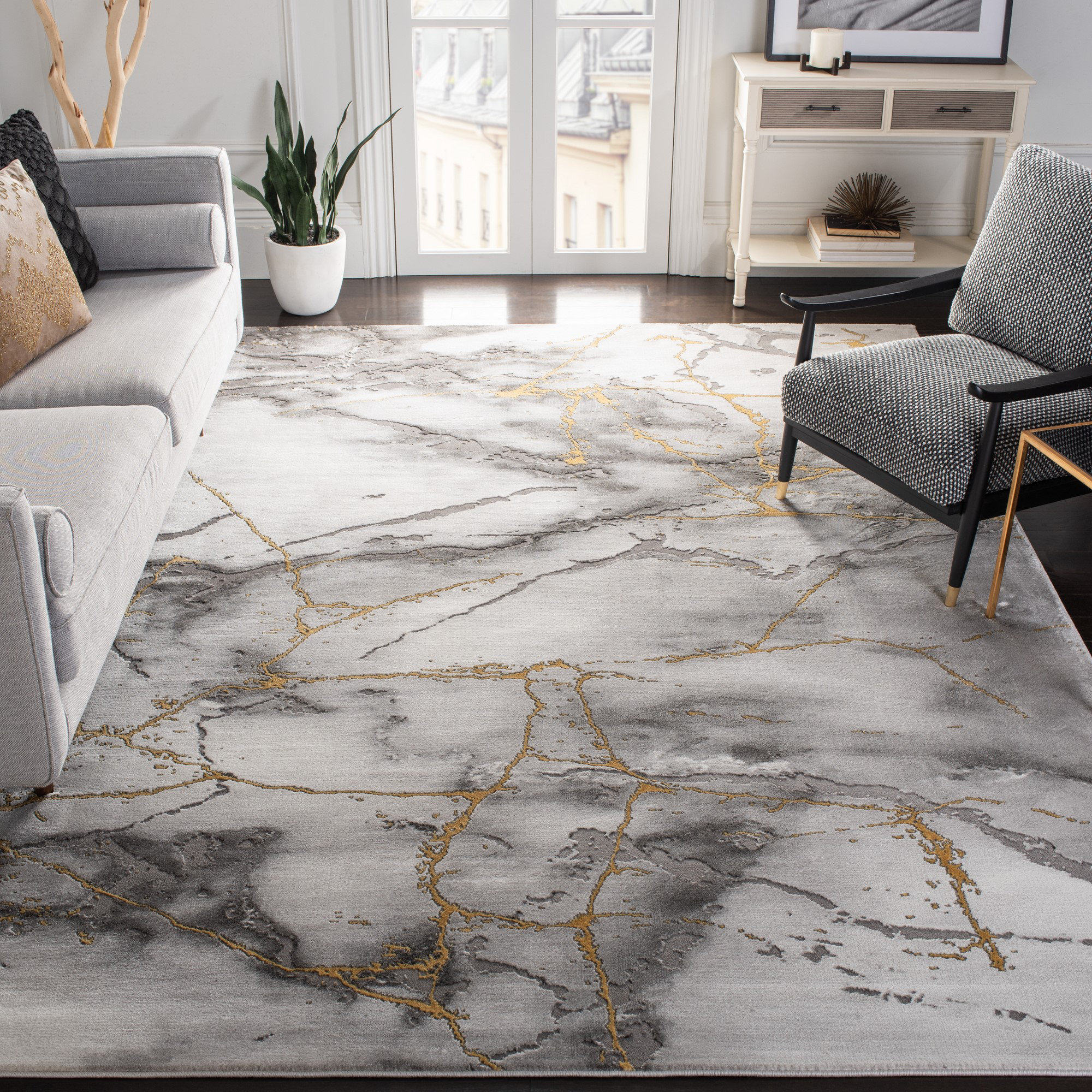 https://assets.wfcdn.com/im/22763316/compr-r85/1315/131590991/swindle-polypropylene-blend-greygold-rug.jpg