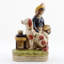 Drum and Dog Figurine