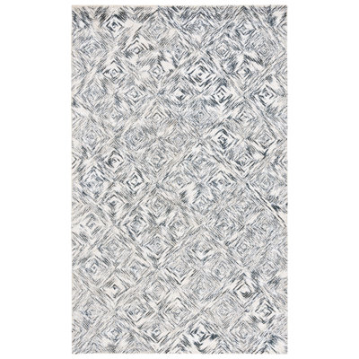 Tapis géométrique vert / ivoire en laine / coton touffeté à la main Christapher