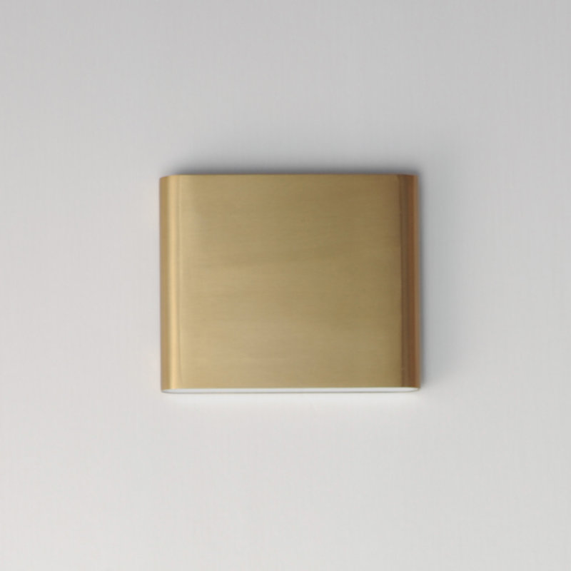 Spartan-Wall Sconce, 6.25" H x 7.75" W x 1.5" D, Natural Aged Brass
