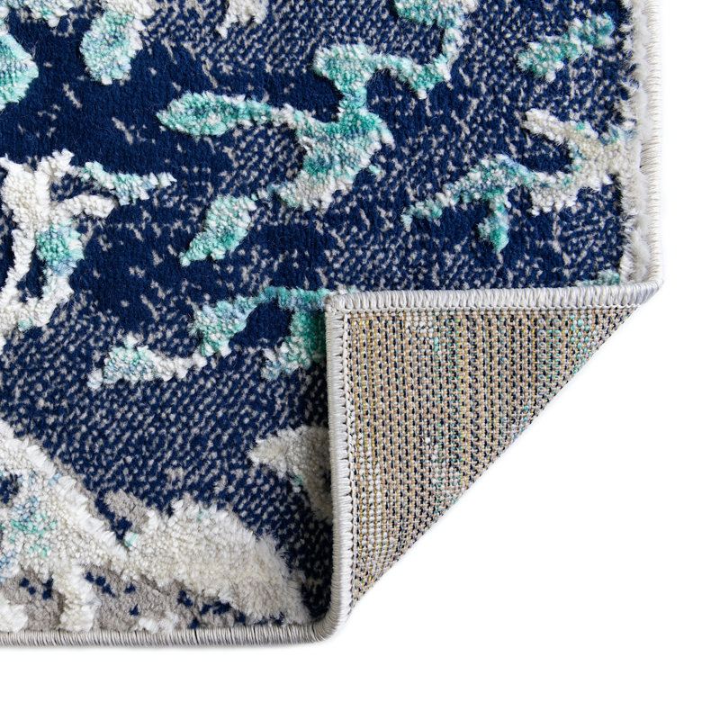 Tapis bleu turquoise à motif animalier Orason, Rond 4 pi