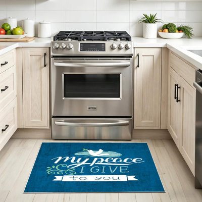 Tapis bleu sarcelle avec lettrage Peace I donner You