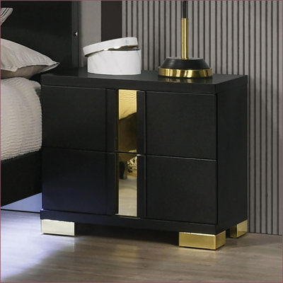 Table de chevet contemporaine noire et dorée avec pieds en métal