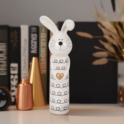 Ceramic Bunny Figurine with Heart Accent.