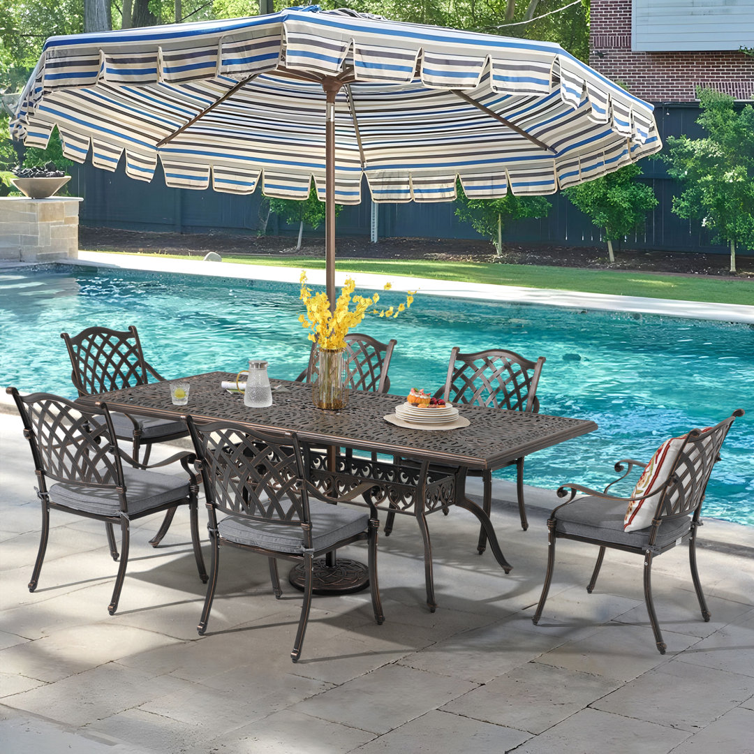 Ambrozie 6 - Person Metal Patio Dining Set with Rectangular Table , Cushions Included Lark Manor™