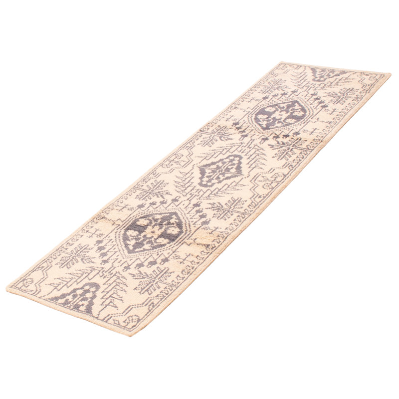 Tapis unique ivoire 2 pi 7 po x 8 pi 10 po
