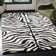 Christoper Hand Tufted Wool Animal Print Rug