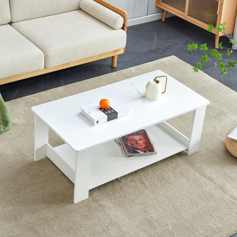 Une table basse moderne et pratique. La table basse à double couche est fabriquée en panneau de fibres à densité moyenne. Convient pour le salon, la chambre à coucher et le bureau.