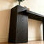 Console en bois de style moderne.-178166325