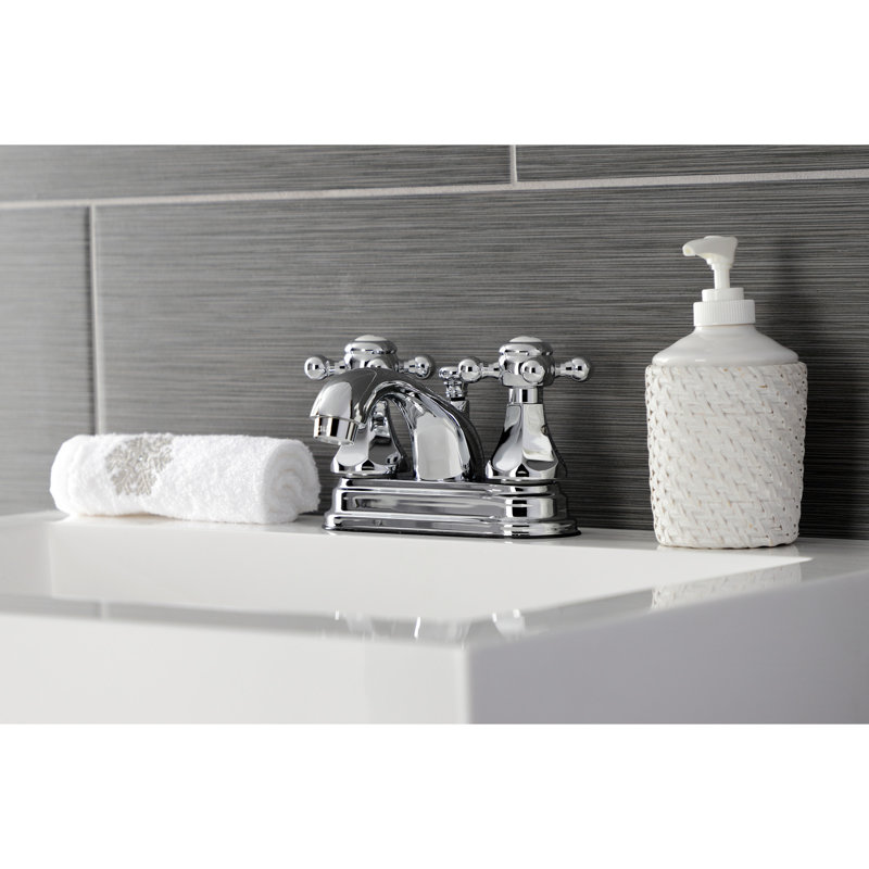 Kingston Brass Metropolitan Two-Handle 3-Hole Deck Mount 4" Centerset Bathroom Faucet with Plastic Pop-Up, Polished Chrome