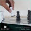 Jeu d'échecs fait à la main en marbre blanc et noir-87347234