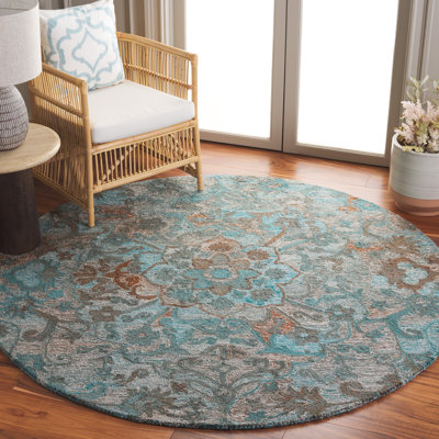 Fredel Floral Hand Tufted Polyester Area Rug in Blue/Brown