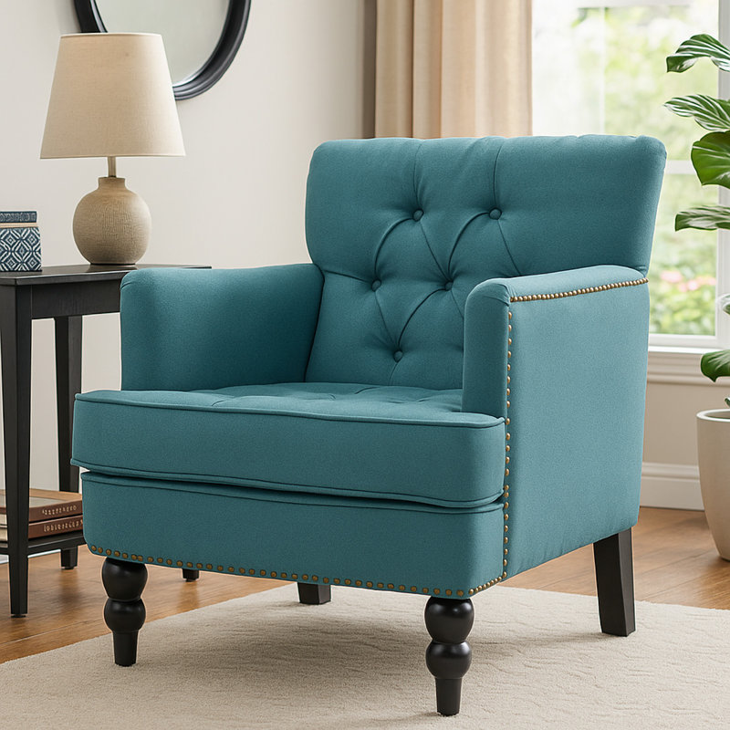 Fauteuil club éclairé capitonné, tissu bleu sarcelle capitonné, pieds noirs tournés