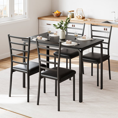 Ensemble de table et chaises modernes 5 pièces pour 4 personnes – Table rectangulaire compacte avec 4 chaises – Idéal pour les petits appartements ou les cuisines – Noir – Plateau en MDF