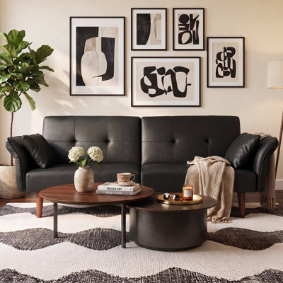 Ebern Designs Faux Leather Upholstered Futon Sofa Bed with Armrests and Backrest Adjustable with Side Pockets