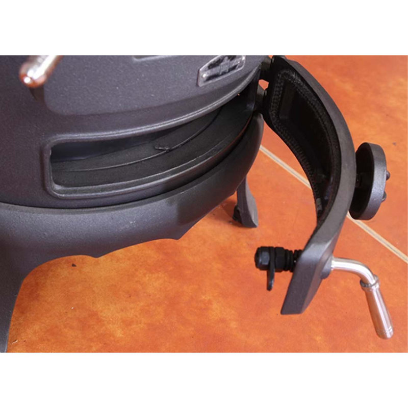 Small cast-iron wood fireplace with boiling water