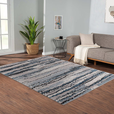 Tapis tissé à rayures bleues
