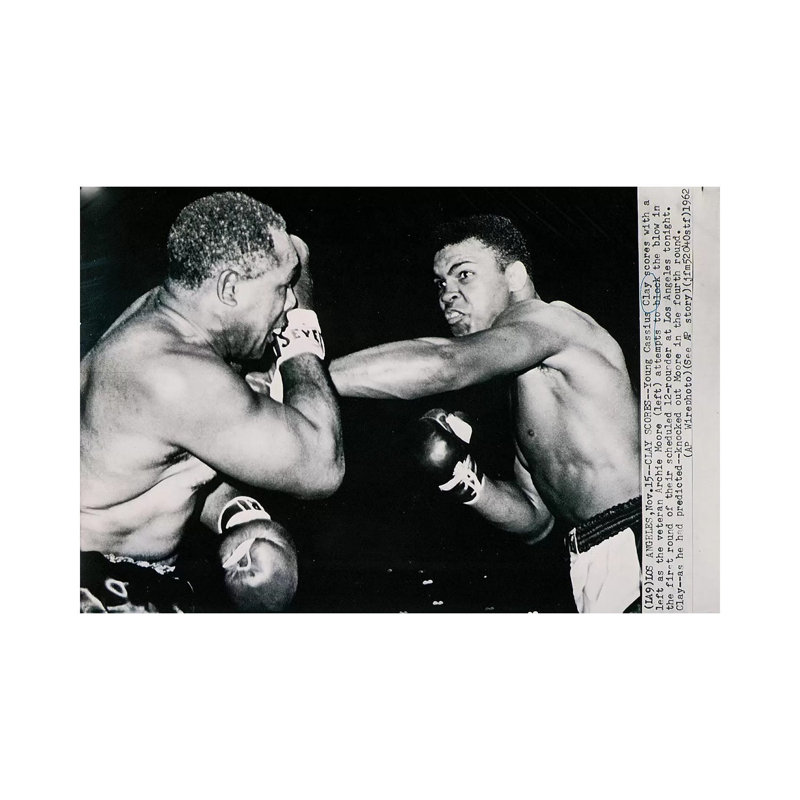 Young Cassius Clay against Archie Moore in the first round. Los Angeles, 15th November 1962 1 Piece Wrapped Canvas Wall Art
