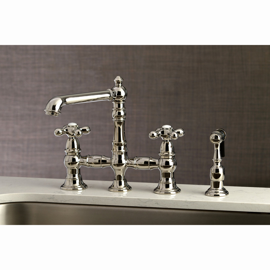 Kingston Brass English Country Two-Handle 4-Hole Deck Mount Bridge Kitchen Faucet with Brass Side Sprayer Kingston Brass 