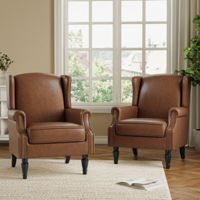 Duward Upholstered Brown Faux Leather Wingback Accent Chair with Nailhead Trim