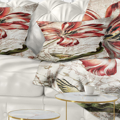 Coussin décoratif à motif floral rouge avec papillon