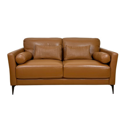 Causeuse en cuir brun clair avec 5 coussins
