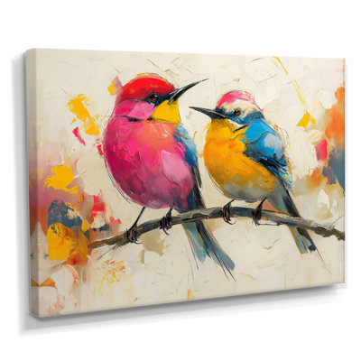 Oiseaux roses et jaunes sur une branche florale