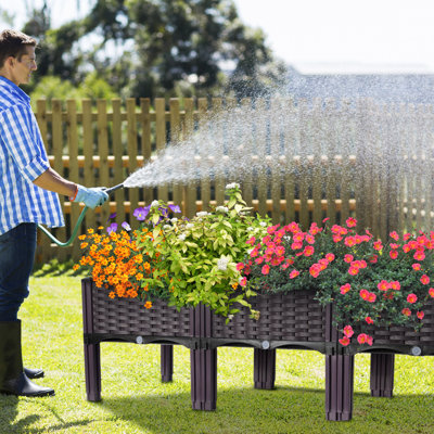 Lit de jardin surélevé pour l'extérieur en plastique de style rotin 47 "avec pieds