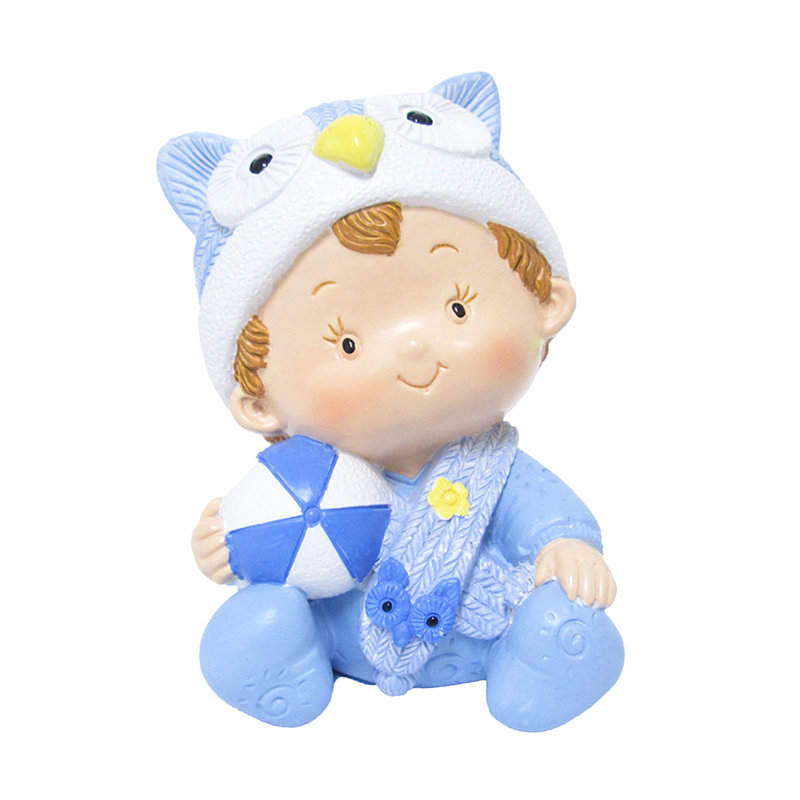 Figurine bébé garçon avec boule