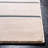 Aslin Striped Ivory / Navy Area Rug-1582718656