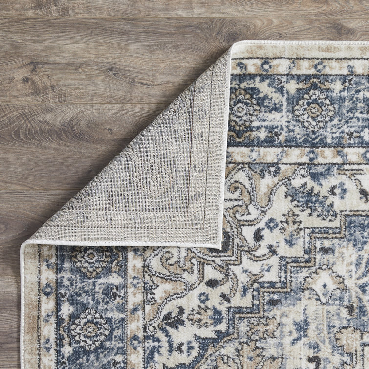 Aldijana Oriental Machine Woven Polypropylene Area Rug in Blue/Cream