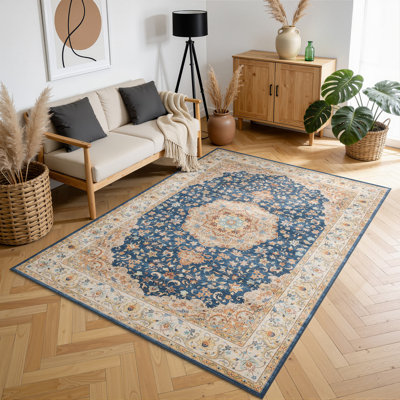 Eaglin 143D240A59A642C18D4694F49AA1BA2B Navy Area Rug