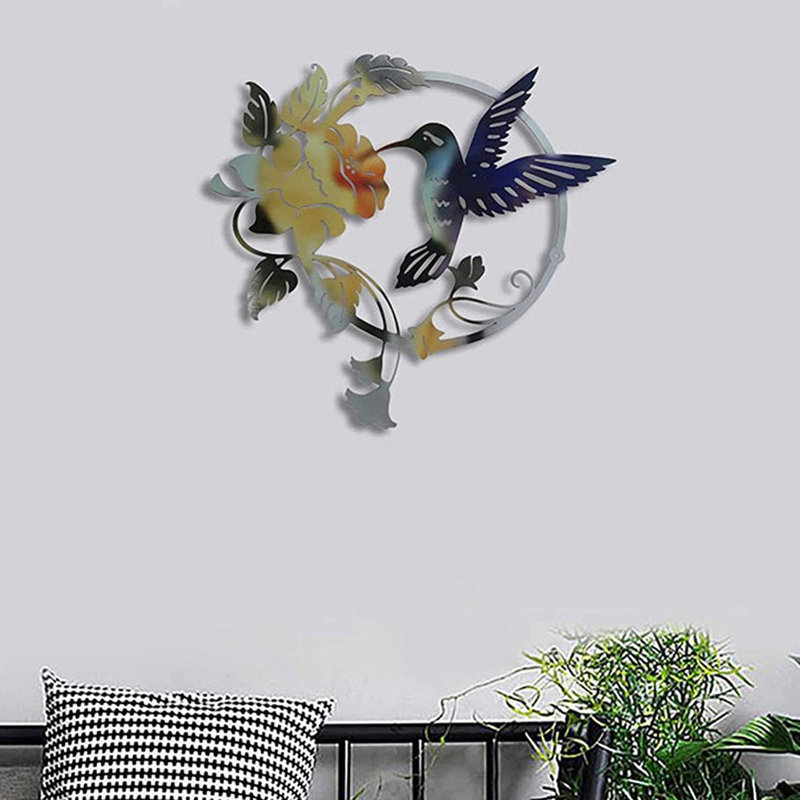 Art mural rond en métal avec oiseaux