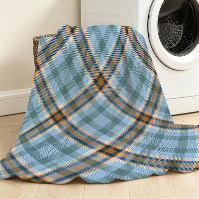 Jeté en flanelle bleue ultra douce, imprimé tartan sur fond uni
