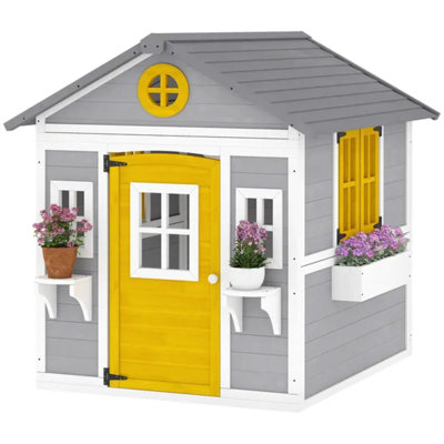 Maisonnette pour enfants grise en bois avec portes, fenêtres et pots à fleurs pour enfants de 3 à 8 ans