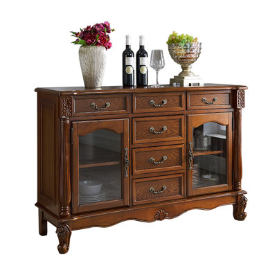 Buffet bas 59,06 po en bois massif brun avec colonnes sculptées, portes en verre arquées et armoire de rangement à six tiroirs