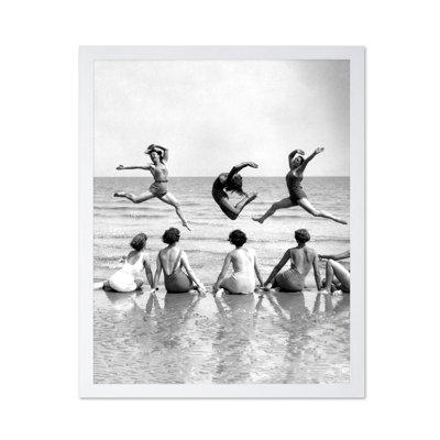 Women Dancing on The Beach