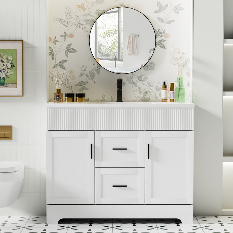 Meuble-lavabo autoportant Breonica de 42 po avec lavabo intégré en résine, design cannelé moderne, fini laqué PU résistant à l'eau, portes et tiroirs à fermeture amortie pour la rénovation de votre salle de bain.