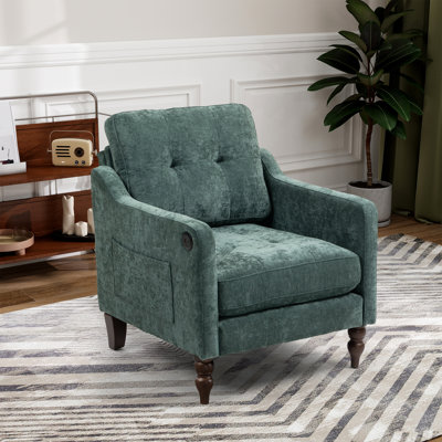 Fauteuil rembourré avec accoudoirs carrés et capitonnés
