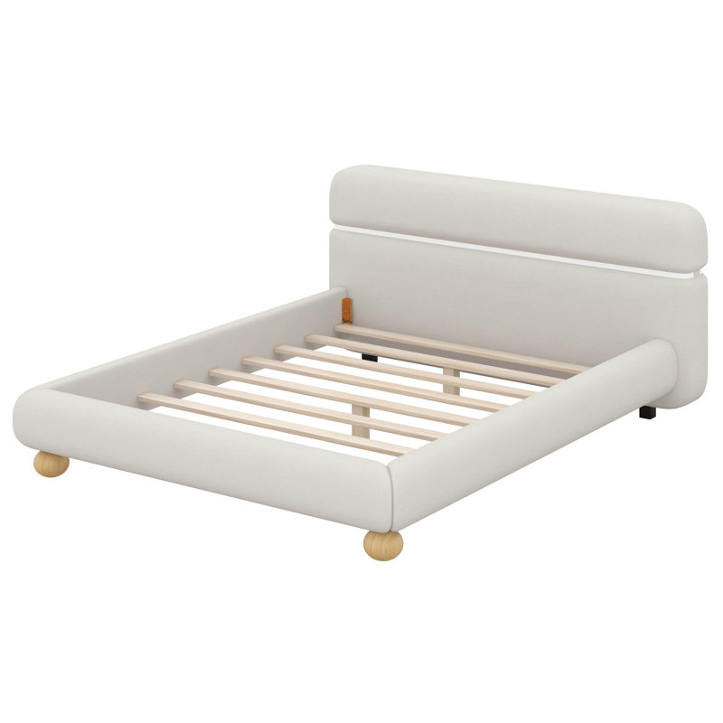 Lit tapissier contemporain avec tissu bouclé en molleton et pieds ronds massifs, design courbé élégant pour la chambre à coucher