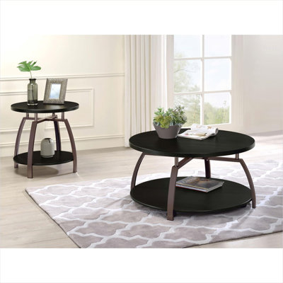 Table basse ronde noire foncée avec plateau en bois gris foncé et base en acier à finition nickel sur roulettes pour les salons contemporains