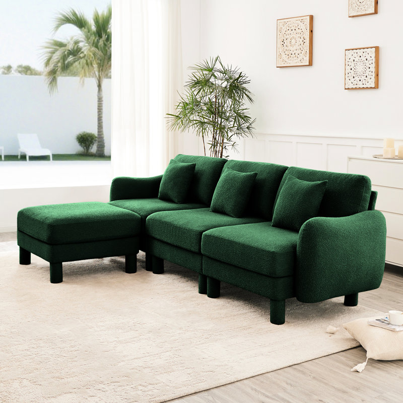 Tissu à 3 boucles avec dossier élégamment incurvé, amovible et doux pour un canapé relaxant. Configuration élégante des pieds cylindriques.